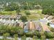 Aerial view showcases the neighborhood's layout with cul-de-sac homes and the nearby golf course at 5664 Legend Hills Ln, Spring Hill, FL 34609