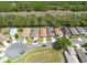 Aerial view of a neighborhood with well-maintained homes and landscaping at 5664 Legend Hills Ln, Spring Hill, FL 34609