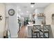 Bright kitchen features stainless steel appliances, light countertops, and nautical-themed decorations at 6070 80Th N St # 104, St Petersburg, FL 33709