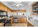Updated kitchen with granite countertops and modern appliances at 610 Island Way # 302, Clearwater Beach, FL 33767