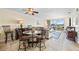 Open-concept living area with tile floors and waterfront view at 610 Island Way # 302, Clearwater Beach, FL 33767