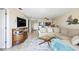 Bright living room featuring tile flooring and comfortable seating at 610 Island Way # 302, Clearwater Beach, FL 33767