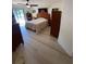 Bright bedroom with modern vinyl floors and comfortable queen-sized bed at 7006 41St E Ave, Bradenton, FL 34208