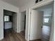 Hallway connecting bathroom, storage and bedroom at 7608 Lakeside Blvd, Tampa, FL 33614