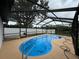 Screened in Kidney shaped pool with updated screen and ample room for entertaining, lounging and relaxation at 7608 Lakeside Blvd, Tampa, FL 33614