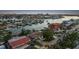 An aerial view of a waterfront home showcasing its pool, boat dock, and scenic surroundings at 7912 3Rd S Ave, St Petersburg, FL 33707