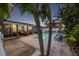 A backyard with inviting pool and deck at 7912 3Rd S Ave, St Petersburg, FL 33707