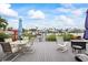 Waterfront deck with outdoor seating and stunning views at 7912 3Rd S Ave, St Petersburg, FL 33707