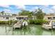 This home has a private boat dock with direct access to the waterway, perfect for boating enthusiasts at 7912 3Rd S Ave, St Petersburg, FL 33707