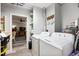 Laundry room featuring a washer, dryer, and vinyl plank flooring at 7912 3Rd S Ave, St Petersburg, FL 33707