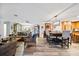Open concept living room and dining area with luxury flooring at 7912 3Rd S Ave, St Petersburg, FL 33707
