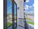 A cozy balcony featuring black railings and beautiful street view at 882 Bay Point Dr, Madeira Beach, FL 33708