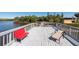 Wide shot from dock, showing a deck, chairs and direct access to water at 8820 S Hickory Ln, Riverview, FL 33578
