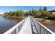 Wooden dock extending into the water, highlighting the property's direct waterfront access and serene views at 8820 S Hickory Ln, Riverview, FL 33578