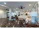 Spacious living room with decorative lighting, tile flooring, and ceiling fans at 8820 S Hickory Ln, Riverview, FL 33578