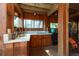 Convenient outdoor kitchen with sink, cooktop, and fridge, perfect for entertaining at 8820 S Hickory Ln, Riverview, FL 33578
