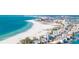 Expansive aerial view showcases the beautiful beach and cityscape at 9415 Blind Pass Rd # 704, St Pete Beach, FL 33706