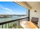 Balcony with seating offers stunning panoramic views of the water and city skyline at 9415 Blind Pass Rd # 704, St Pete Beach, FL 33706