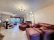 Spacious living room with comfortable seating, providing ample space for relaxation and entertainment at 1102 Springtime Dr, Holiday, FL 34691