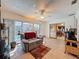 Inviting sunroom with pool views, comfortable seating, and access to the backyard area at 1102 Springtime Dr, Holiday, FL 34691