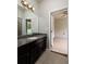 Modern bathroom featuring vanity with granite counters at 11335 77Th E St, Parrish, FL 34219
