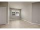 Bright bedroom with tile floors, recessed lighting, and two windows for natural light at 11335 77Th E St, Parrish, FL 34219