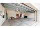 Spacious garage with high ceilings and hanging storage racks at 11335 77Th E St, Parrish, FL 34219