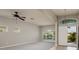 Spacious living room with plush carpeting, ample natural light, and neutral paint at 11335 77Th E St, Parrish, FL 34219