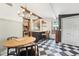 Well-lit kitchen with checkered floors, a breakfast bar, and stylish lighting fixtures at 114 E Emily St, Tampa, FL 33603