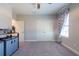 Bedroom featuring plush carpeting and a double door closet for convenient storage at 11966 Climbing Fern Ave, Riverview, FL 33579