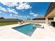 Relaxing backyard swimming pool with a spa and ample space for lounge chairs and gatherings at 11966 Climbing Fern Ave, Riverview, FL 33579