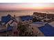 Stunning aerial view of beachfront homes with colorful rooftops, near the ocean at 12512 1St W St # 2, Treasure Island, FL 33706