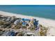 Coastal homes line the pristine beach, providing stunning ocean views and a desirable waterfront lifestyle at 12512 1St W St # 2, Treasure Island, FL 33706