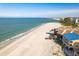 Waterfront homes with beach access are nestled on the coastline, offering picturesque views and serene living at 12512 1St W St # 2, Treasure Island, FL 33706