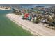 Aerial view of beachside homes with direct access to the Gulf and scenic waterfront at 12512 1St W St # 2, Treasure Island, FL 33706