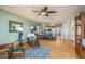 Inviting living room blends with dining area and open kitchen concept at 12512 1St W St # 2, Treasure Island, FL 33706
