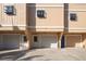 Charming townhouses featuring multiple garages, offering convenient parking and storage in a well-maintained community at 12512 1St W St # 2, Treasure Island, FL 33706