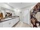 Bathroom showcasing vanity with double sinks and a shower with decorative curtain at 12841 Wildflower Meadow Dr, Riverview, FL 33579