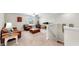 Relaxing living room space featuring neutral walls, comfortable seating, and access to the staircase at 12841 Wildflower Meadow Dr, Riverview, FL 33579