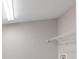 Walk in closet with ventilated shelving and plenty of room for storage at 14403 Woodland Spur Dr, Lithia, FL 33547