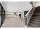 Bright, open kitchen features a large island, white cabinets, and stainless steel appliances at 14403 Woodland Spur Dr, Lithia, FL 33547