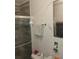 Clean and bright bathroom featuring modern fixtures, white marble tile, and a glass shower at 14633 Sassandra Dr, Odessa, FL 33556