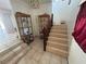 Hallway with staircase and decorative shelving at 14633 Sassandra Dr, Odessa, FL 33556