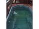 Inviting in-ground hot tub with refreshing water, perfect for relaxation and enjoyment at 14633 Sassandra Dr, Odessa, FL 33556