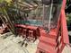 Screened-in outdoor hot tub with bar, offering a perfect blend of relaxation and entertainment at 14633 Sassandra Dr, Odessa, FL 33556