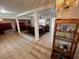 Spacious living and dining area with tile flooring and ample natural light at 14633 Sassandra Dr, Odessa, FL 33556