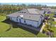 Aerial view of the exterior and roof of the house at 16710 Shell Bay Dr, Land O Lakes, FL 34638