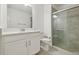 Modern bathroom with tiled shower and flooring, and vanity sink at 16710 Shell Bay Dr, Land O Lakes, FL 34638