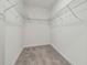 Walk-in closet provides ample storage space with wire shelving at 16710 Shell Bay Dr, Land O Lakes, FL 34638