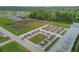 Aerial view of the beautiful community garden with raised beds for planting at 16710 Shell Bay Dr, Land O Lakes, FL 34638